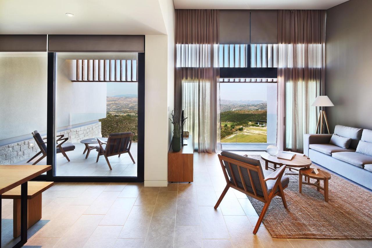 Minthis Resort Tsadha المظهر الخارجي الصورة The interior of a typical suite at the hotel