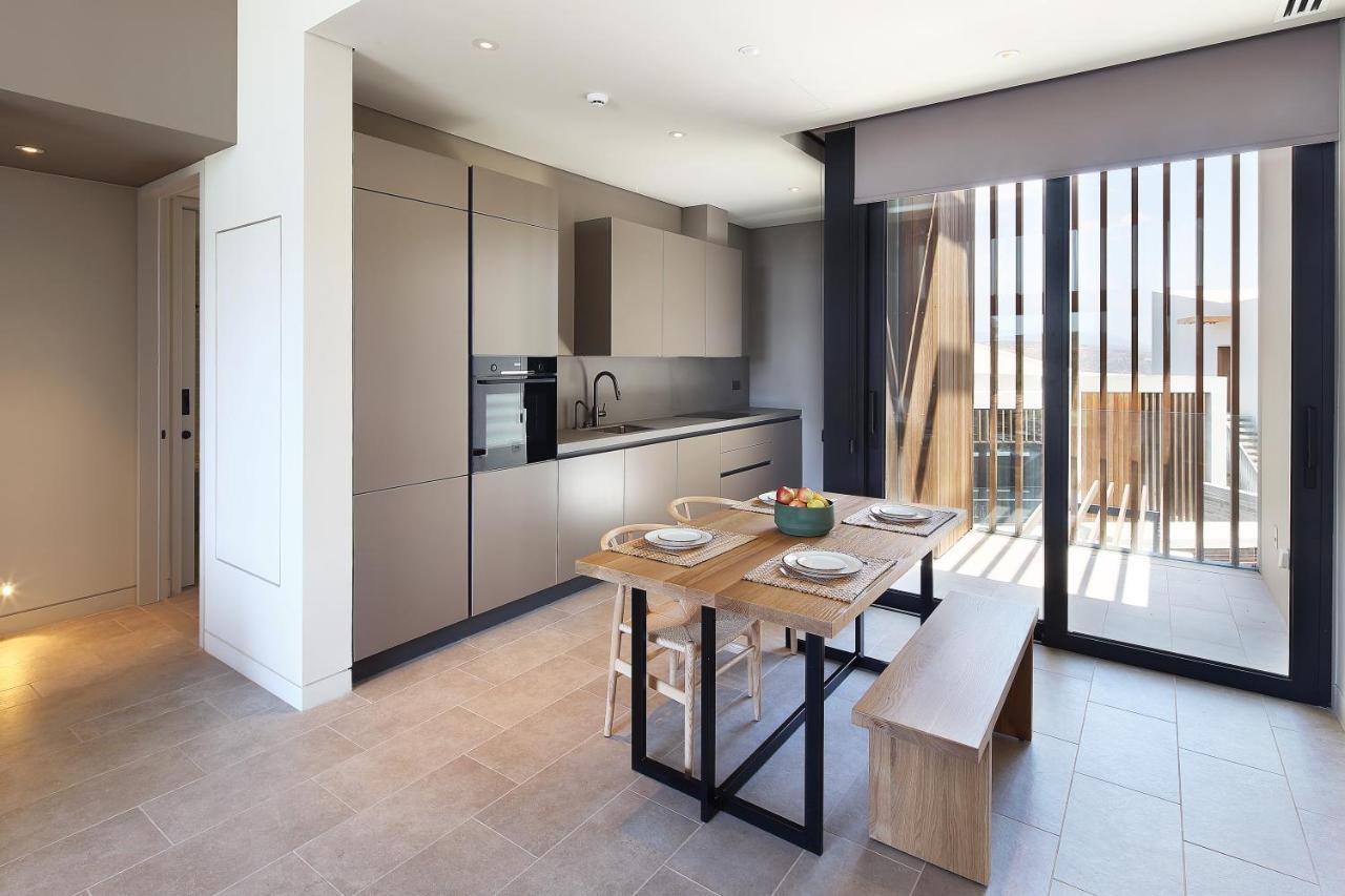 Minthis Resort Tsadha المظهر الخارجي الصورة The kitchen and dining area of a typical apartment