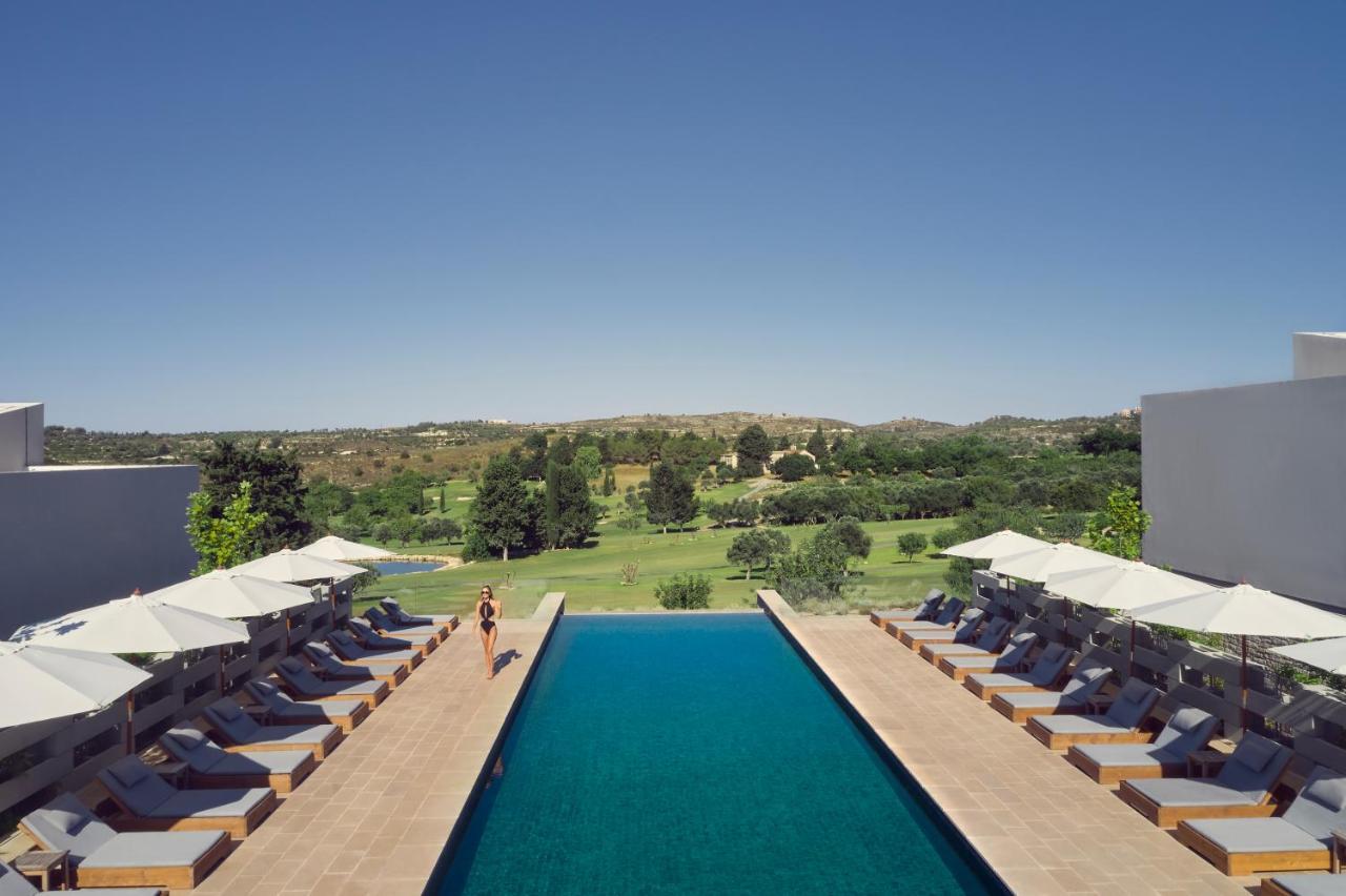 Minthis Resort Tsadha المظهر الخارجي الصورة The pool at the hotel