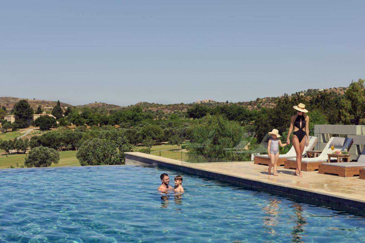 Minthis Resort Tsadha المظهر الخارجي الصورة The pool at the hotel