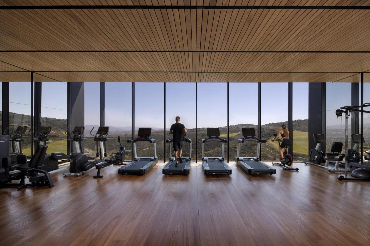 Minthis Resort Tsadha المظهر الخارجي الصورة The gym at the hotel