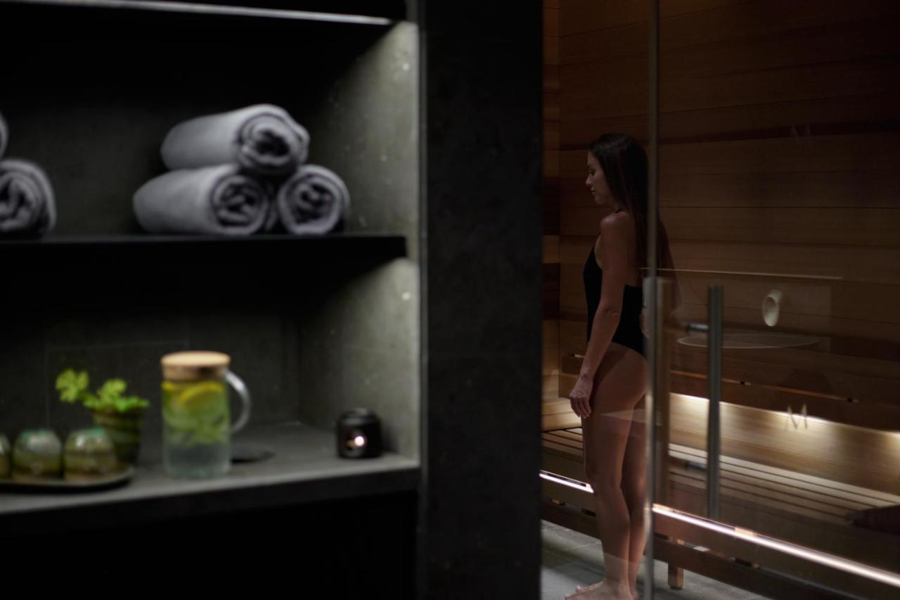 Minthis Resort Tsadha المظهر الخارجي الصورة A woman in a sauna